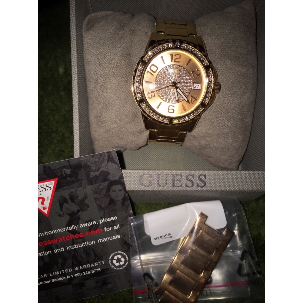 Women’s rose gold GUESS watch
